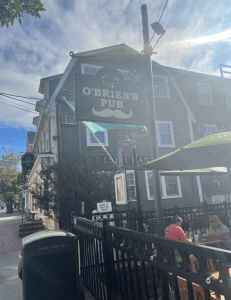This image features a street view of O'Brien's Pub